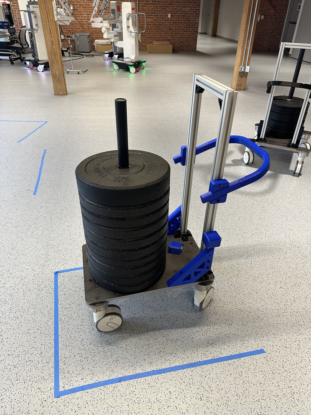 Angled view of the cart showing the weight stack, handle and frame