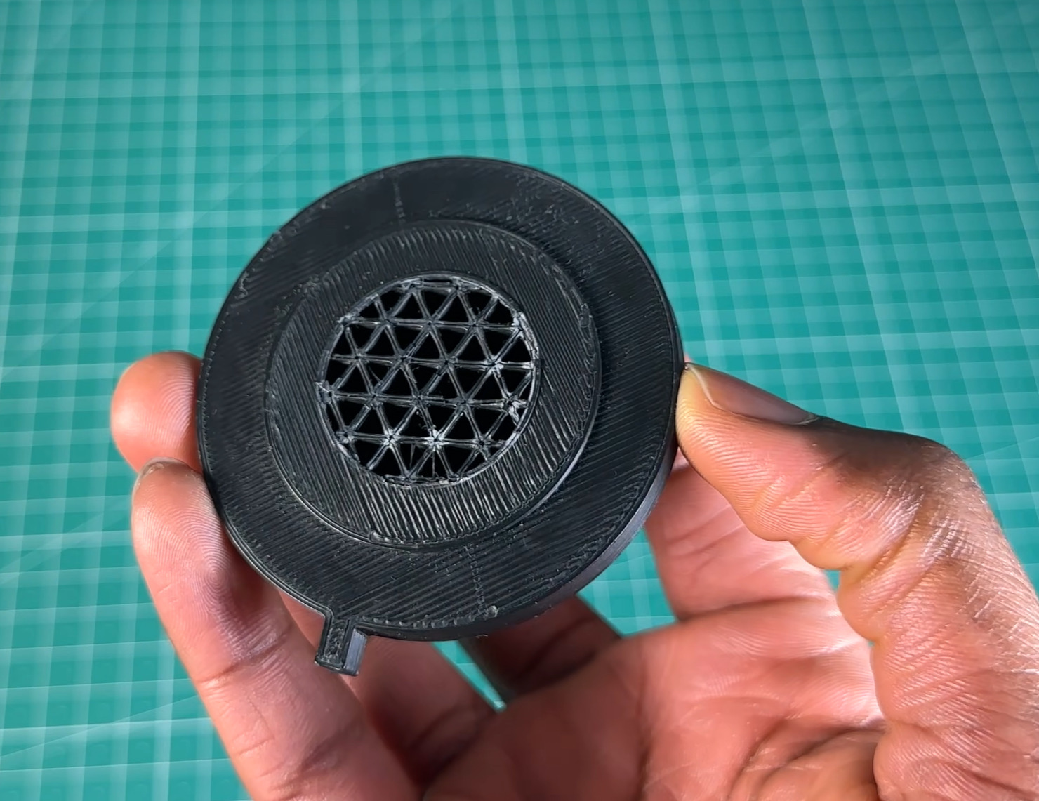 The snapped 3D-printed J3 shaft, showing sparse triangular infill