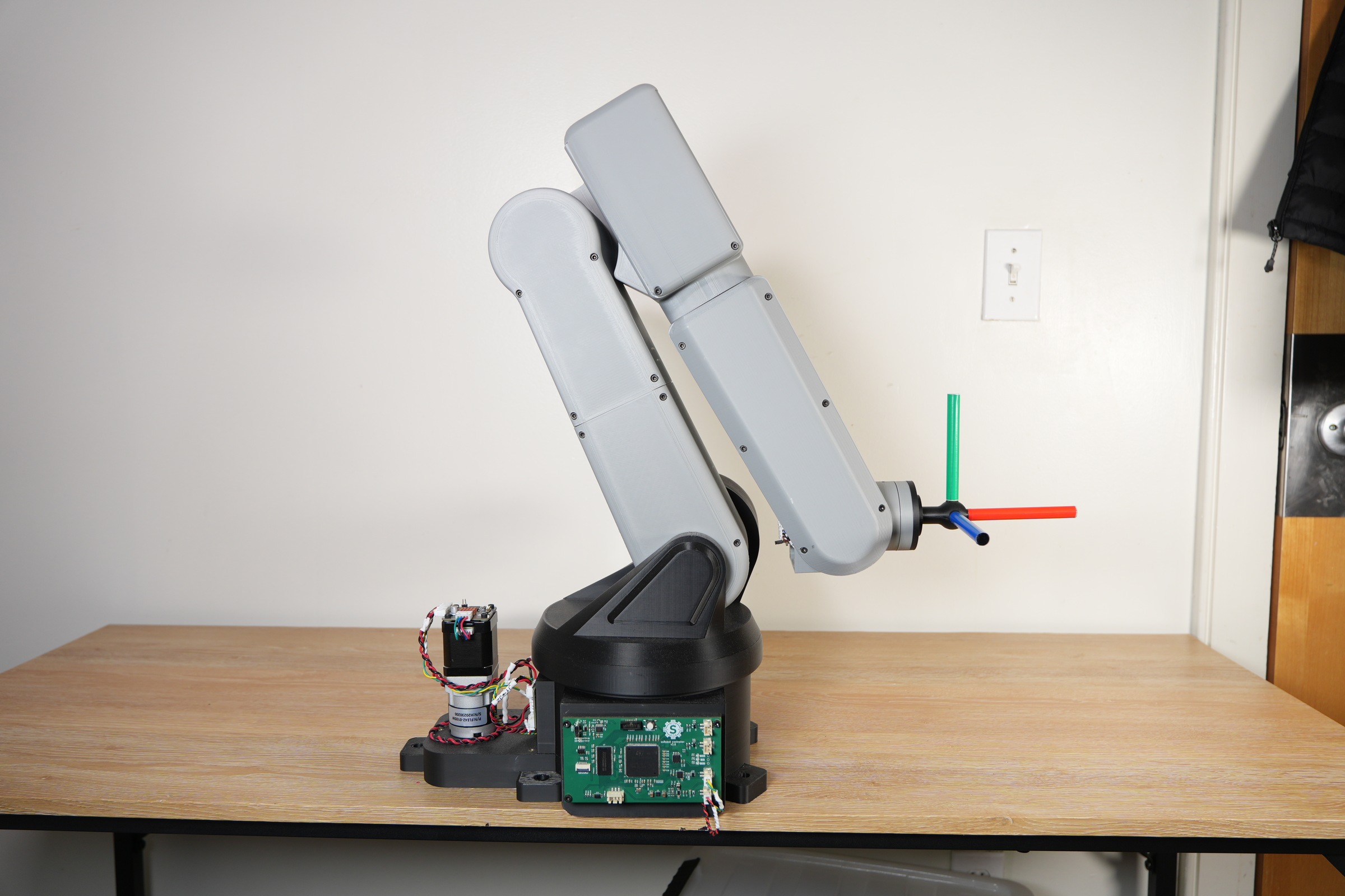 The finished 6-DOF robot arm with an RGB axis triad on the end effector